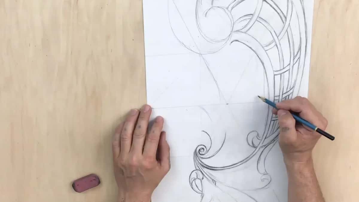 Crossing straps of the basket drawn in pencil beside a scroll, the left hand flat on the sheet