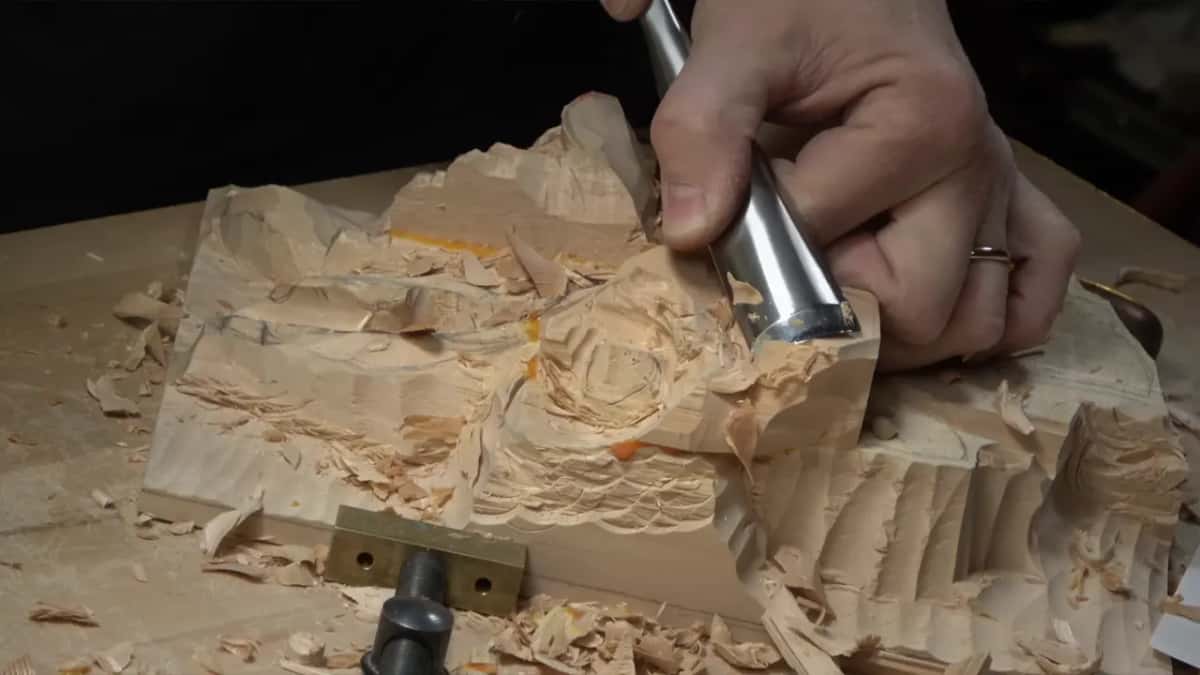 Big gouge going down into the lump, the panel seen side on with chips all around