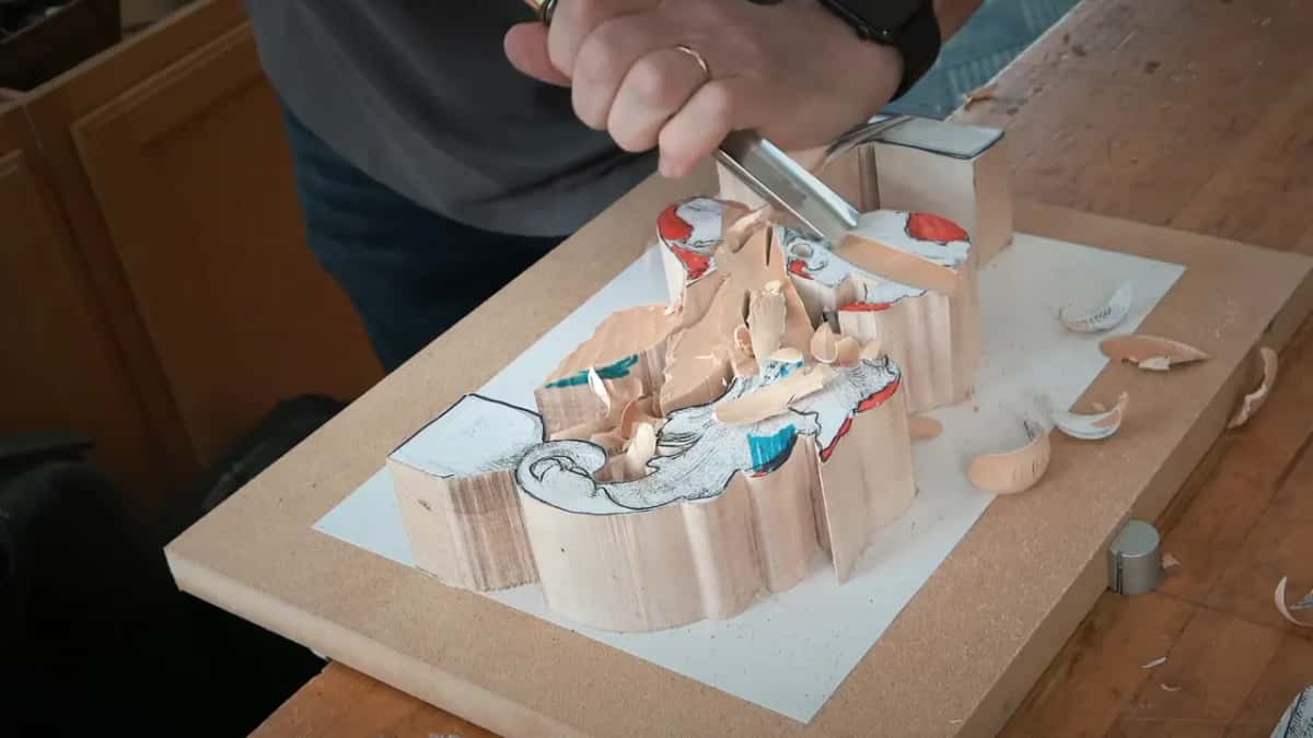The gouge works its way down into the middle while chips stack against the higher walls